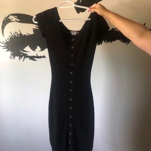 Size M. Miso Stunning simple button down black dress. Worn twice.